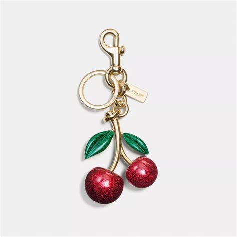 coach outlet cherry charm